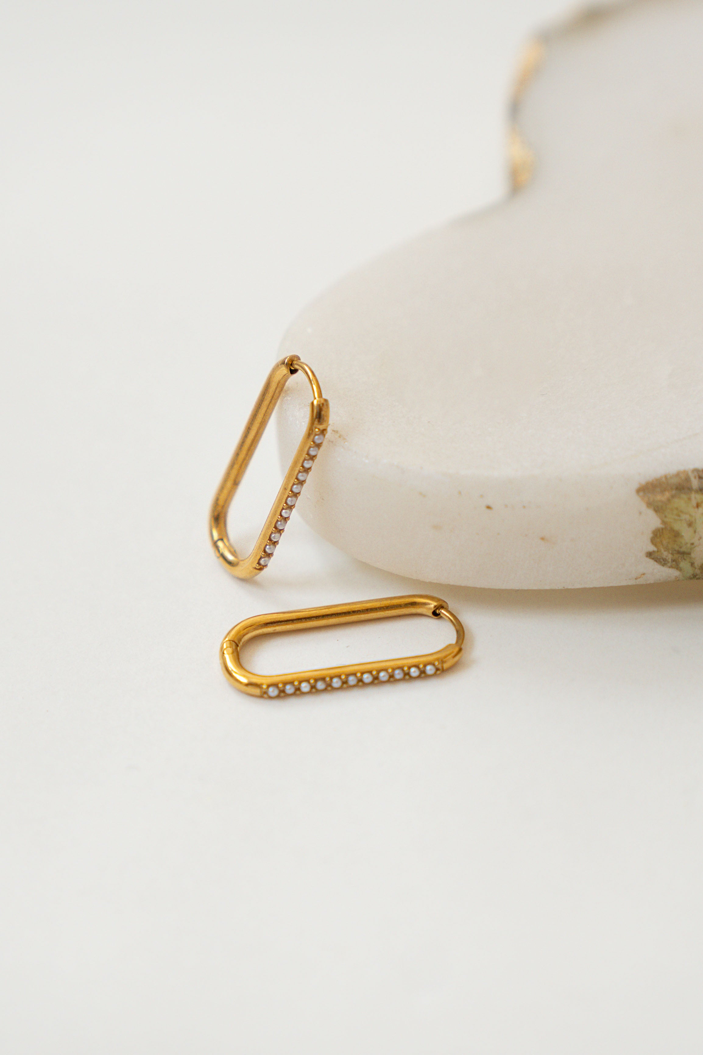 OVAL HOOP EARRINGS WITH STONES