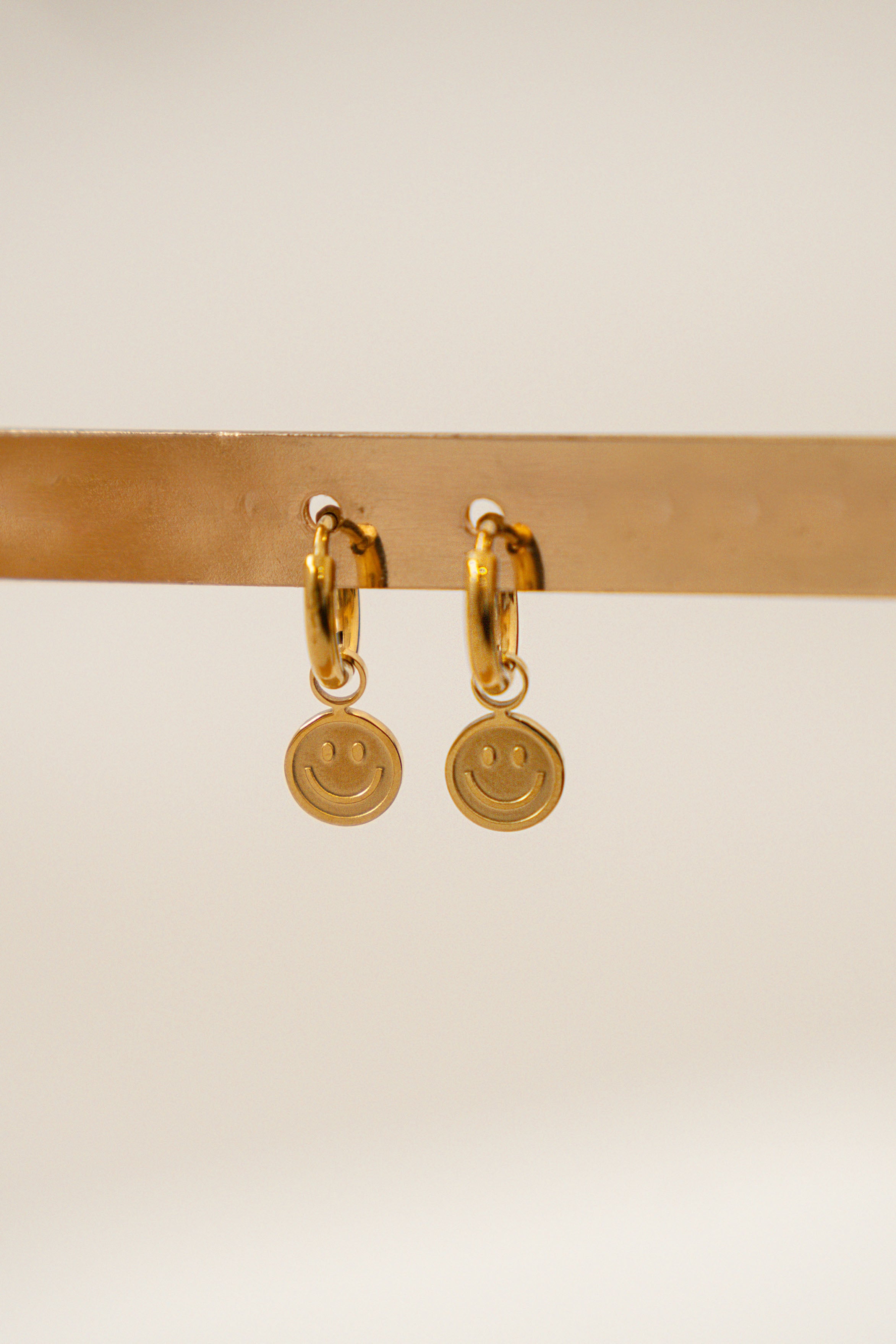 MINI HAPPY FACE HOOP EARRINGS