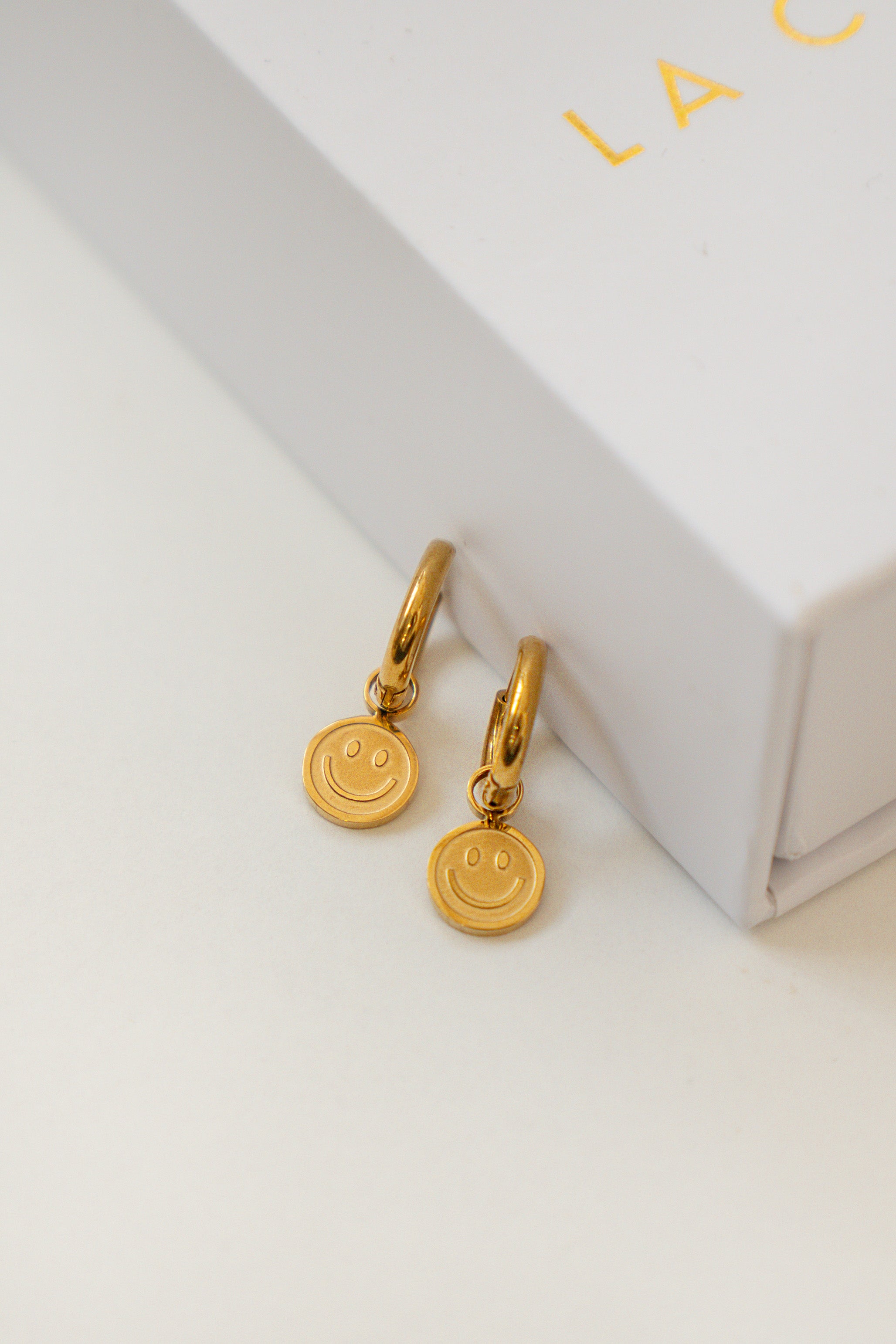 MINI HAPPY FACE HOOP EARRINGS