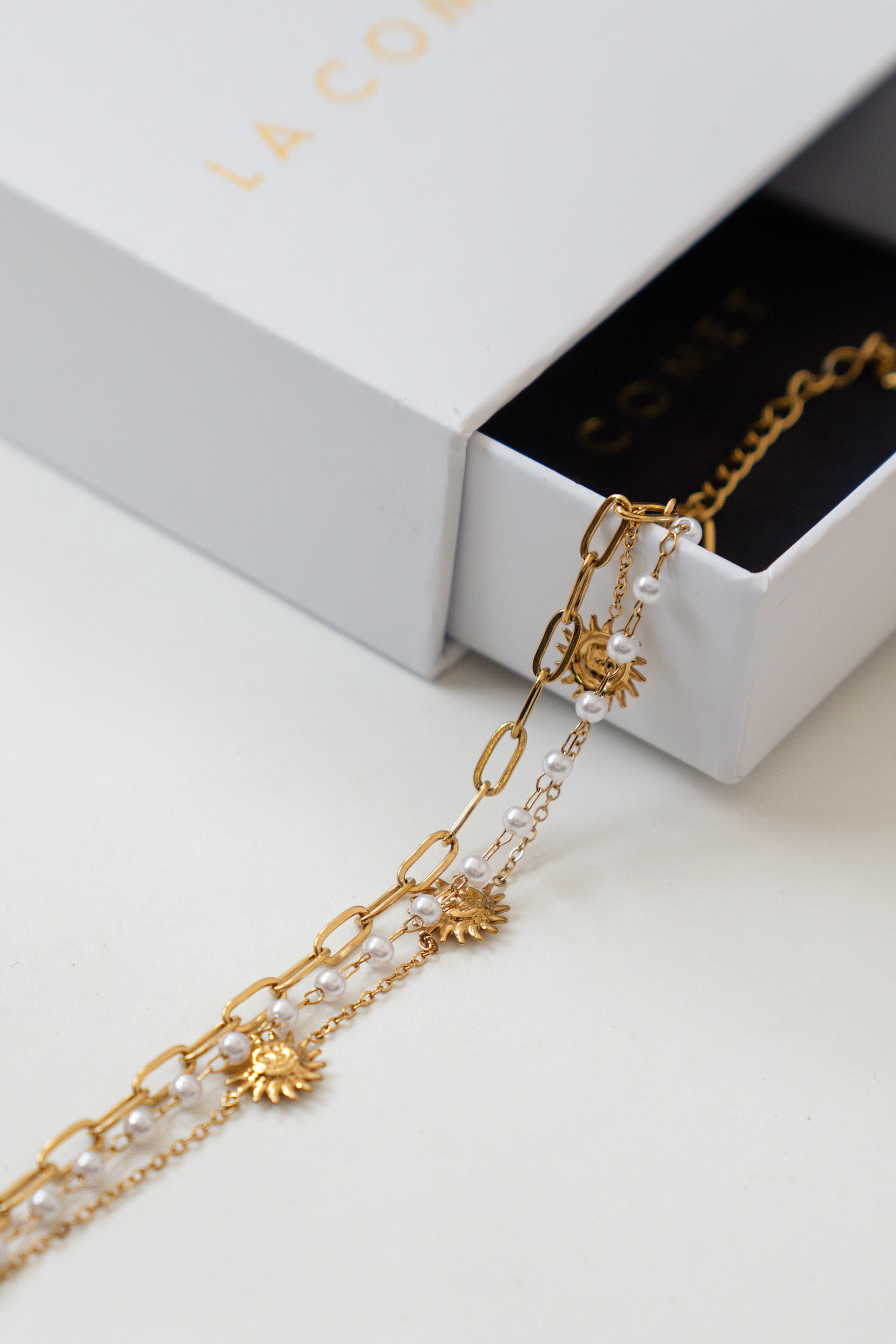 PULSERA TRIPLE SOL Y PERLAS